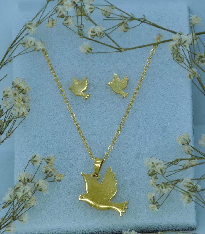 Graceful gold jewellery set featuring a Bird-shaped pendant and matching stud earrings, symbolizing peace and elegance.